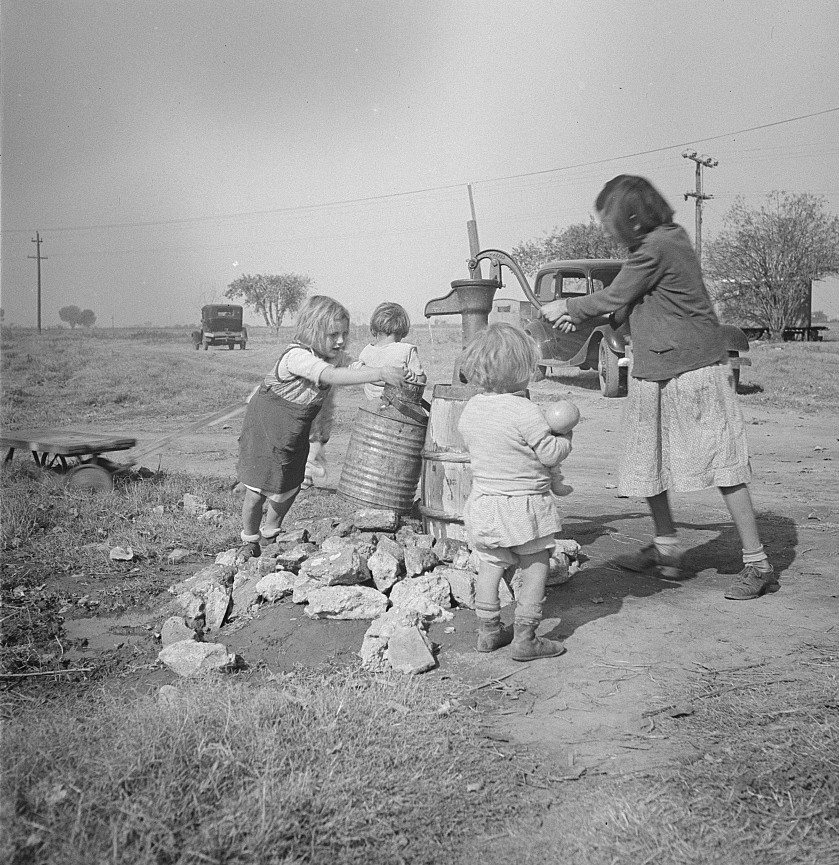 Water supply. Migratory camp for cotton pickers. San Joaquin Valley, California. American River camp