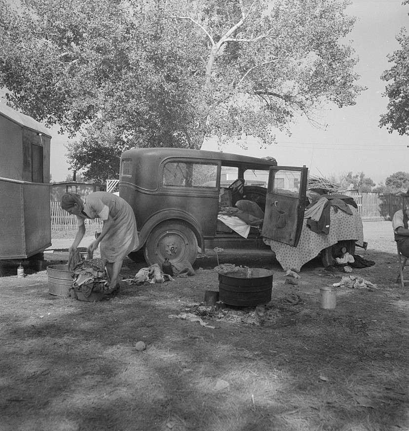 Wife of migratory worker in auto camp. California