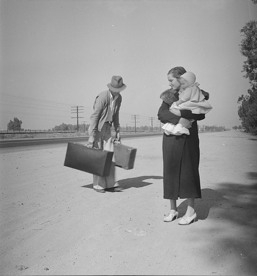 Young family penniless hitchhiking on U.S. Highway 99 in California