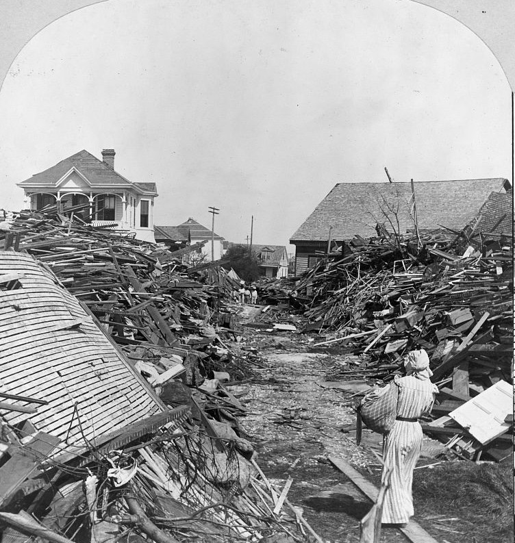 An opened passageway in the debris, North on 19th Street, Galveston, Texas