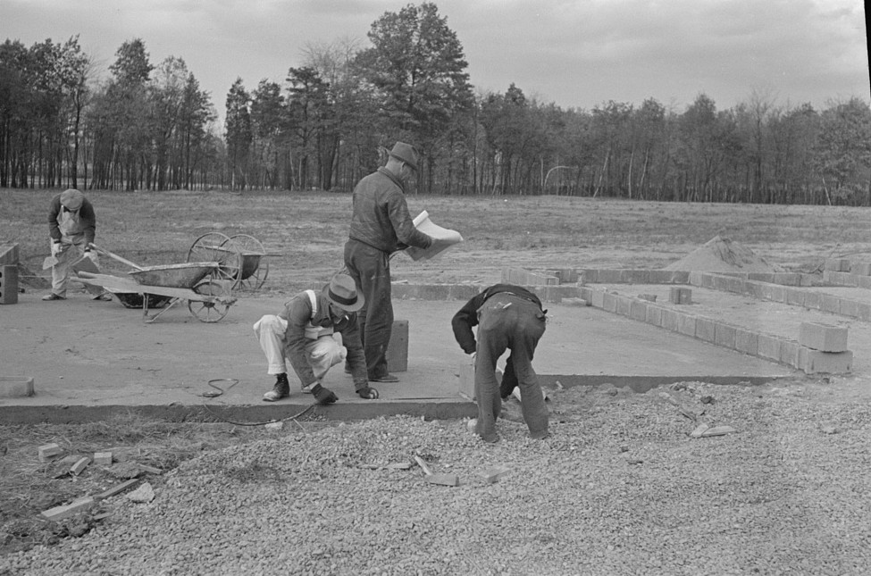 Construction of houses (reading plans and measuring), Jersey Homesteads, Hightstown, New Jersey 1936 russell lee