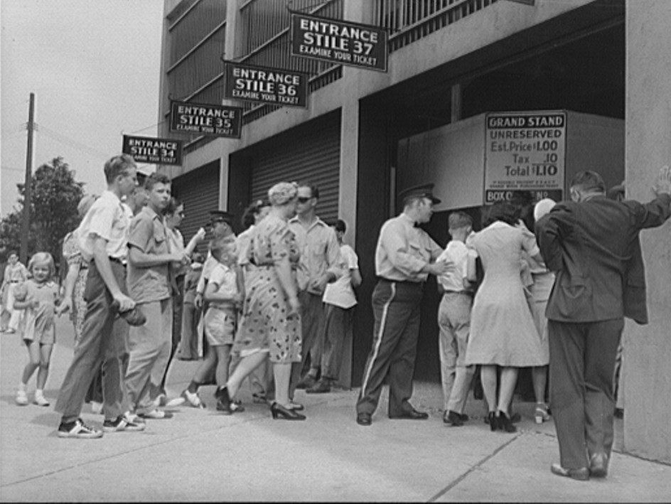 Detroit, Michigan. Buying tickets for the ball game at Briggs Station 1942 John Vachon