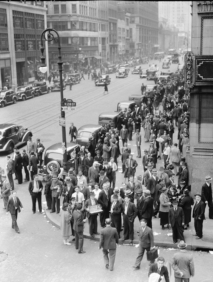 Seventh Avenue and West 28th Street, New York. Garment workers leave the factories for noon hour June 1936