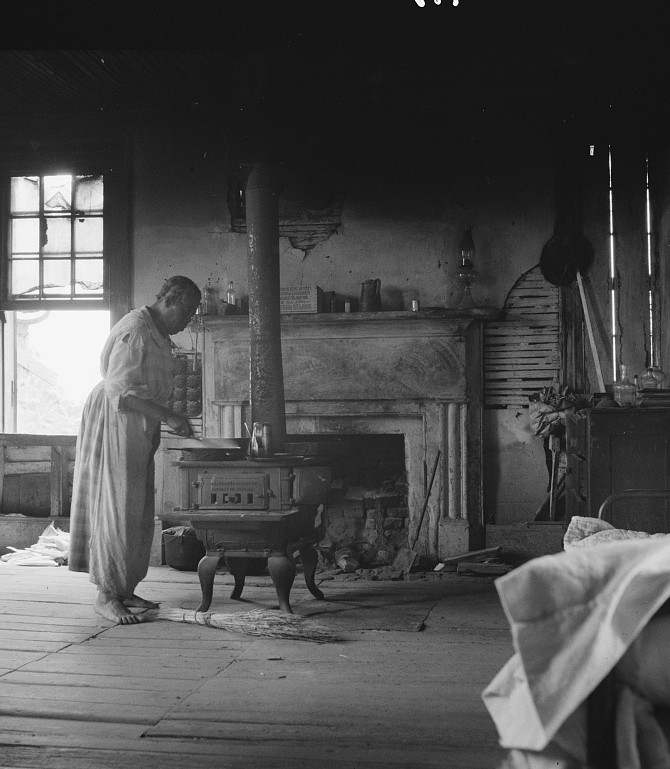 Interior of a plantation house now vacant but for two rooms occupied by an old Negro couple, tenants. Greene County, Georgia2 1937 dorothea lange