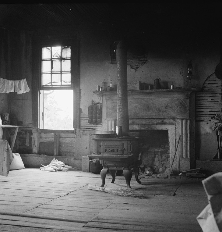 Interior of plantation house now vacant but for two rooms occupied by an old Negro couple. Negro tenants, Greene County, Georgia 1937 dorothea lange