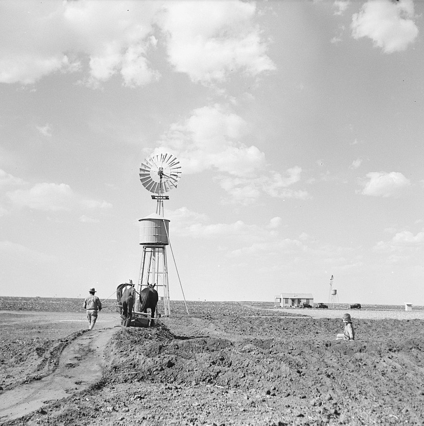 Constructing an earth tank. Ropesville rural community, Texas by photographer Arthur Rothstein April 1936