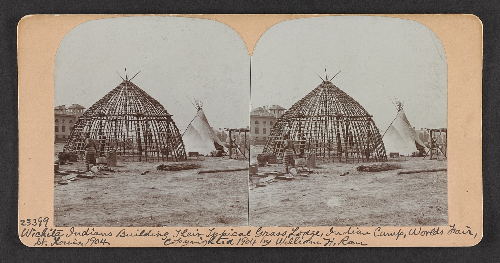 Wichita Indians building their typical grass lodge, Indian camp, World's Fair, St. Louis, 1904