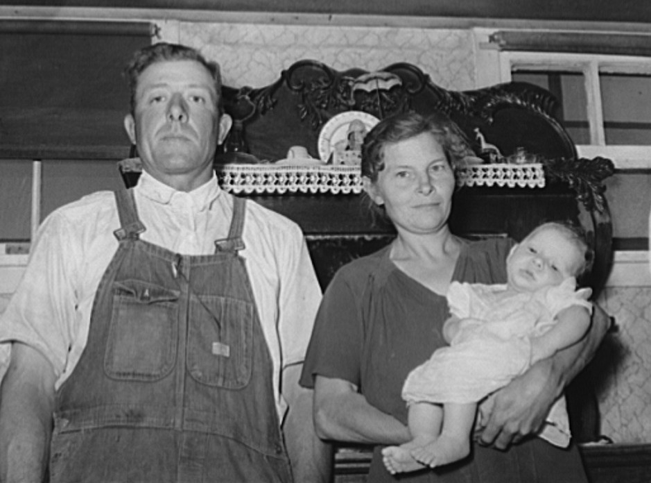 William Rall, wife and baby, FSA (Farm Security Administration) clients in Sheridan County, Kansas russell lee 1939