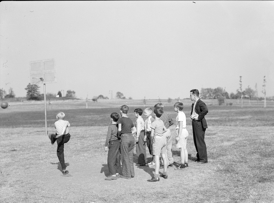 Children with atheletic instructor Ohio October 1938, by photographer John Vachon