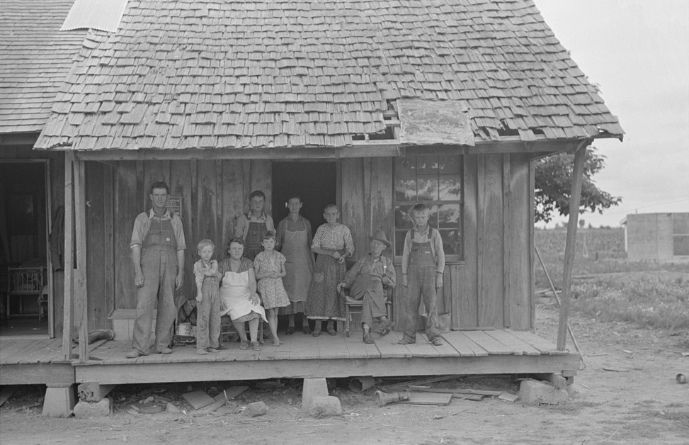 Sharecropper family on front porch Southeast, Missouri by Photographer Russell Lee 1938